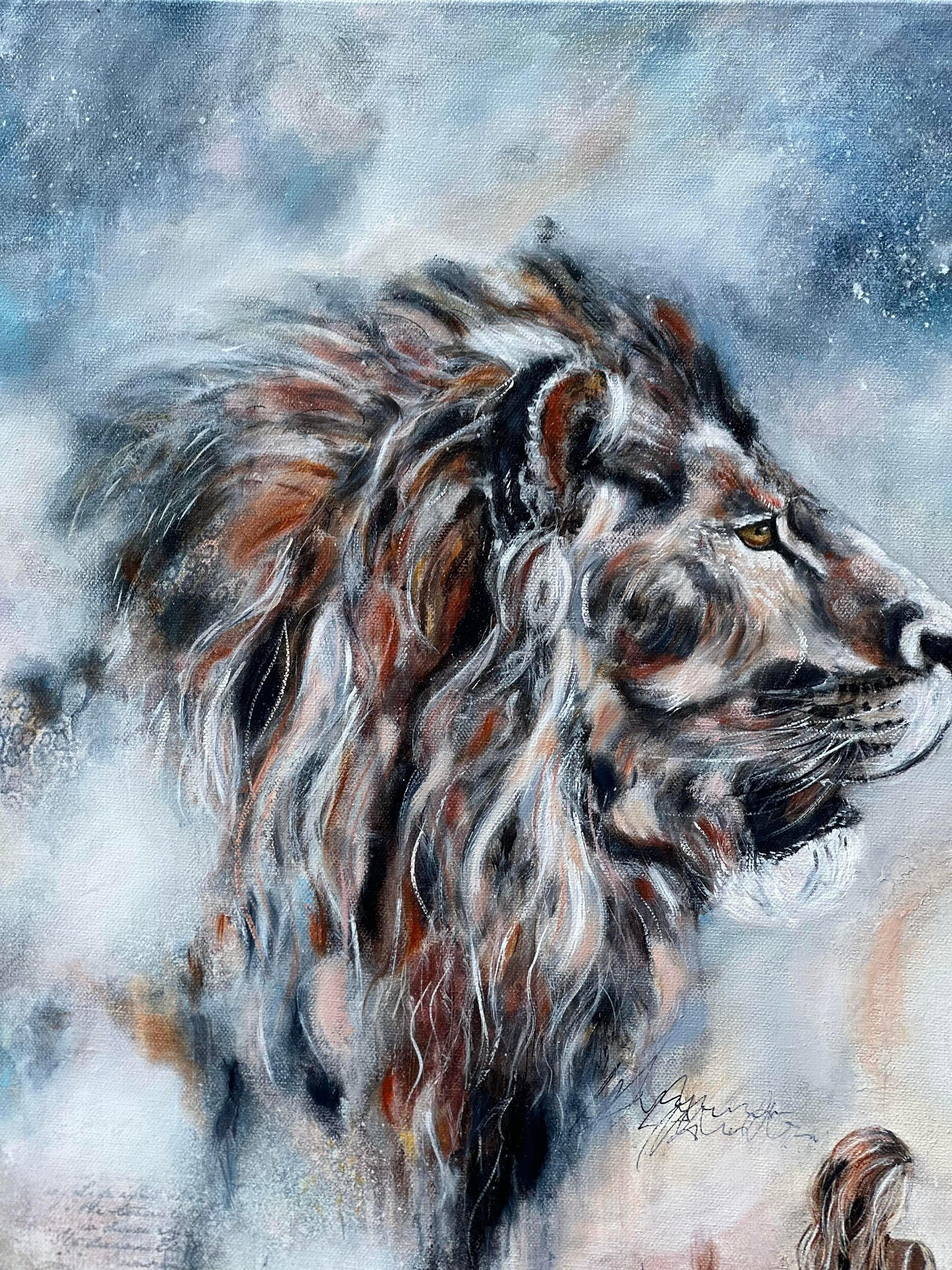 Lion with a women next to it staring into distance, into some place the eyes cannot see. 